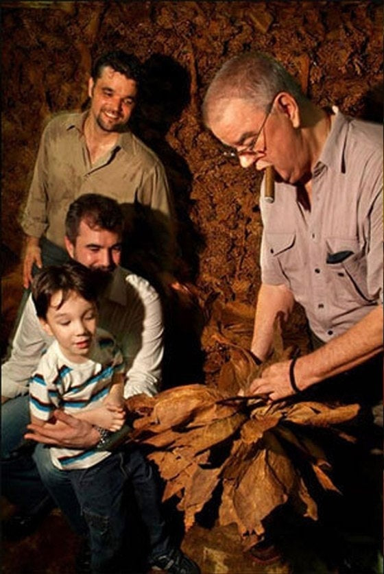 Three generations of the cigar making tradition in one photo